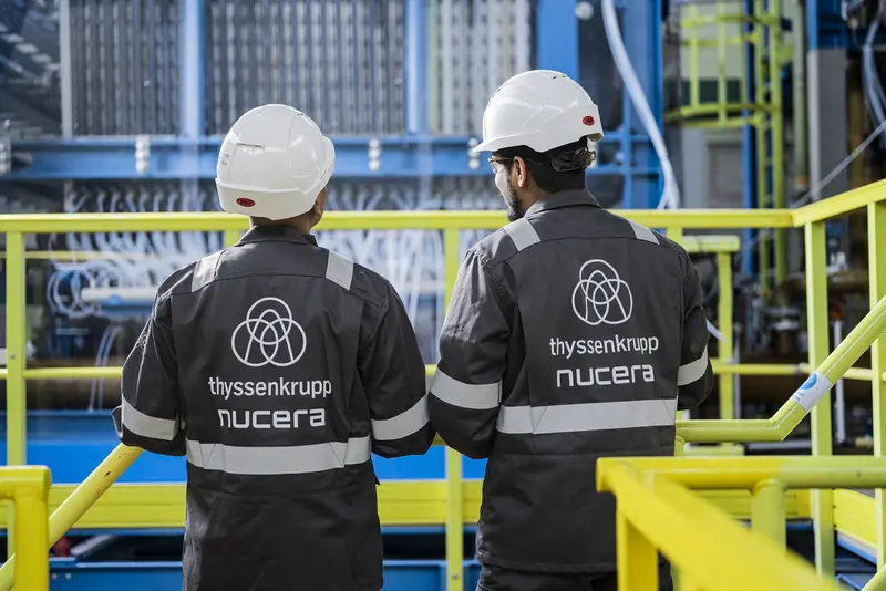 Employees of thyssenkrupp nucera at electrolyzer 